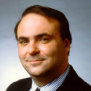 Headshot of John Koza, a Stanford professor and the founder of National Popular Vote, Inc.